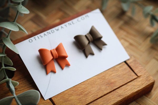 BROWN AND ORANGE BOWS