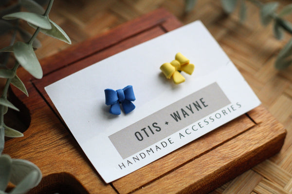 LITTLE BLUE AND YELLOW BOWS