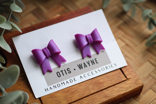 PURPLE BOWS