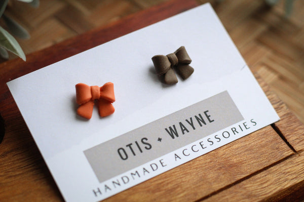 LITTLE ORANGE AND BROWN BOWS