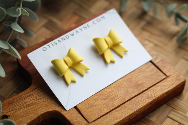 BIG YELLOW BOWS